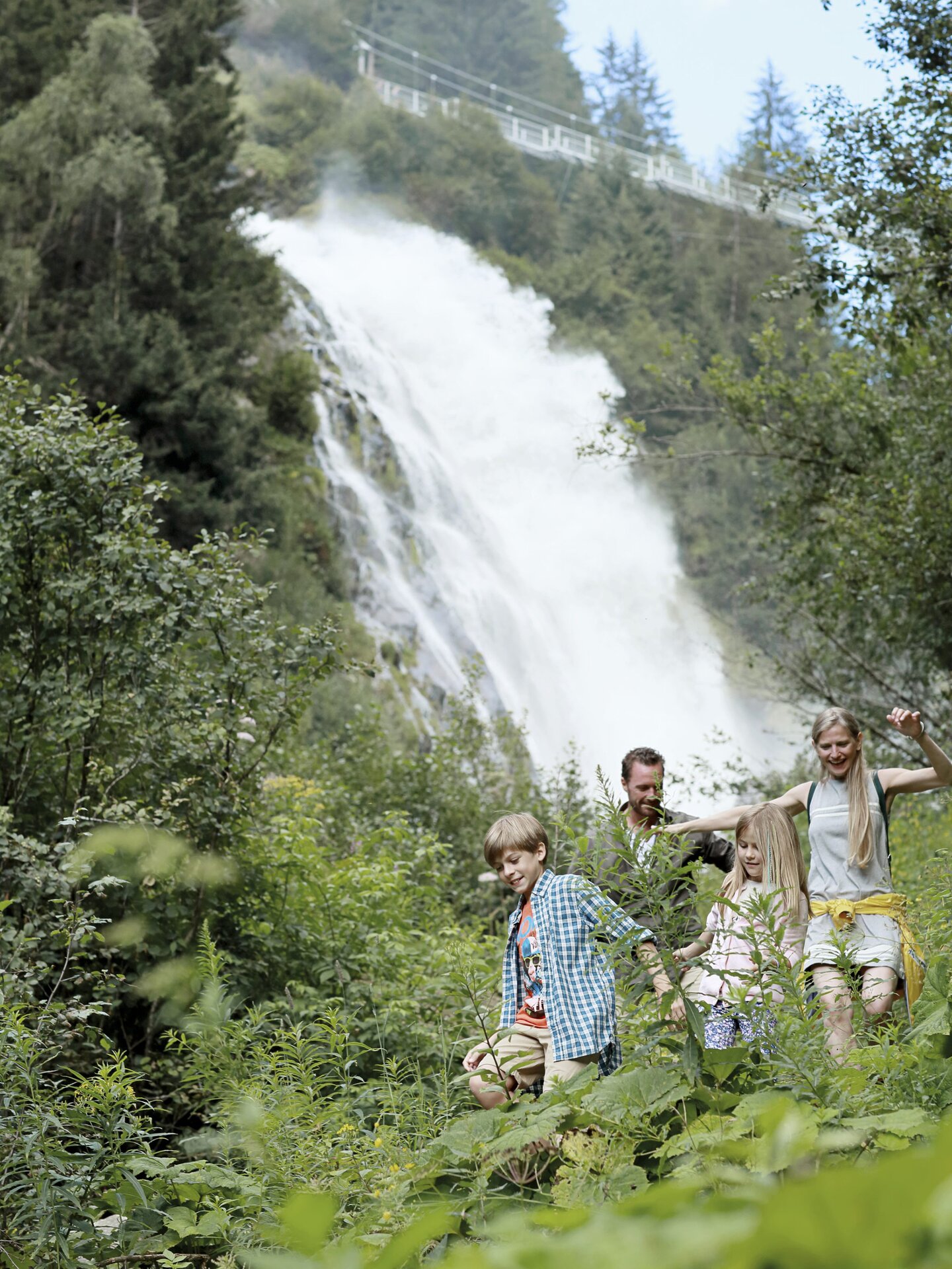 Family hike waterfall in the Ötztal valley