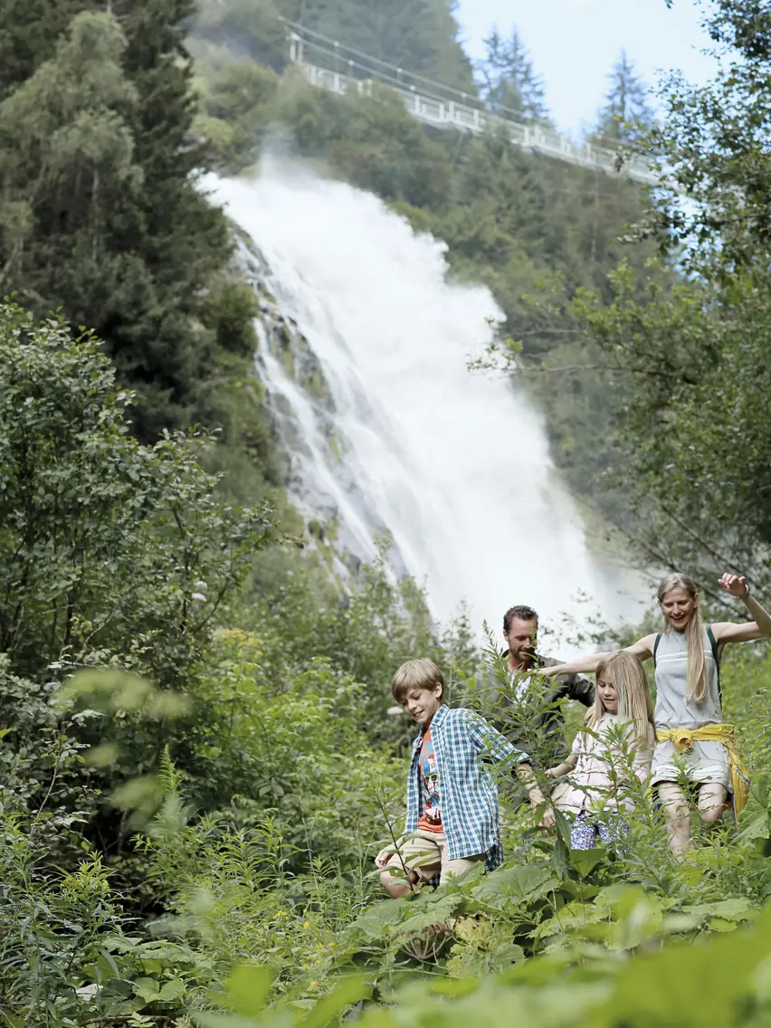 Family hike waterfall in the Ötztal valley